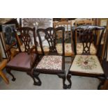 Three Chippendale revival dining chairs