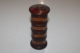 A wooden spice tower