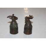 Two Tibetan bronze stirrup or ritual cups