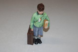 A Royal Doulton figure "The Boy Evacuee" HN3202