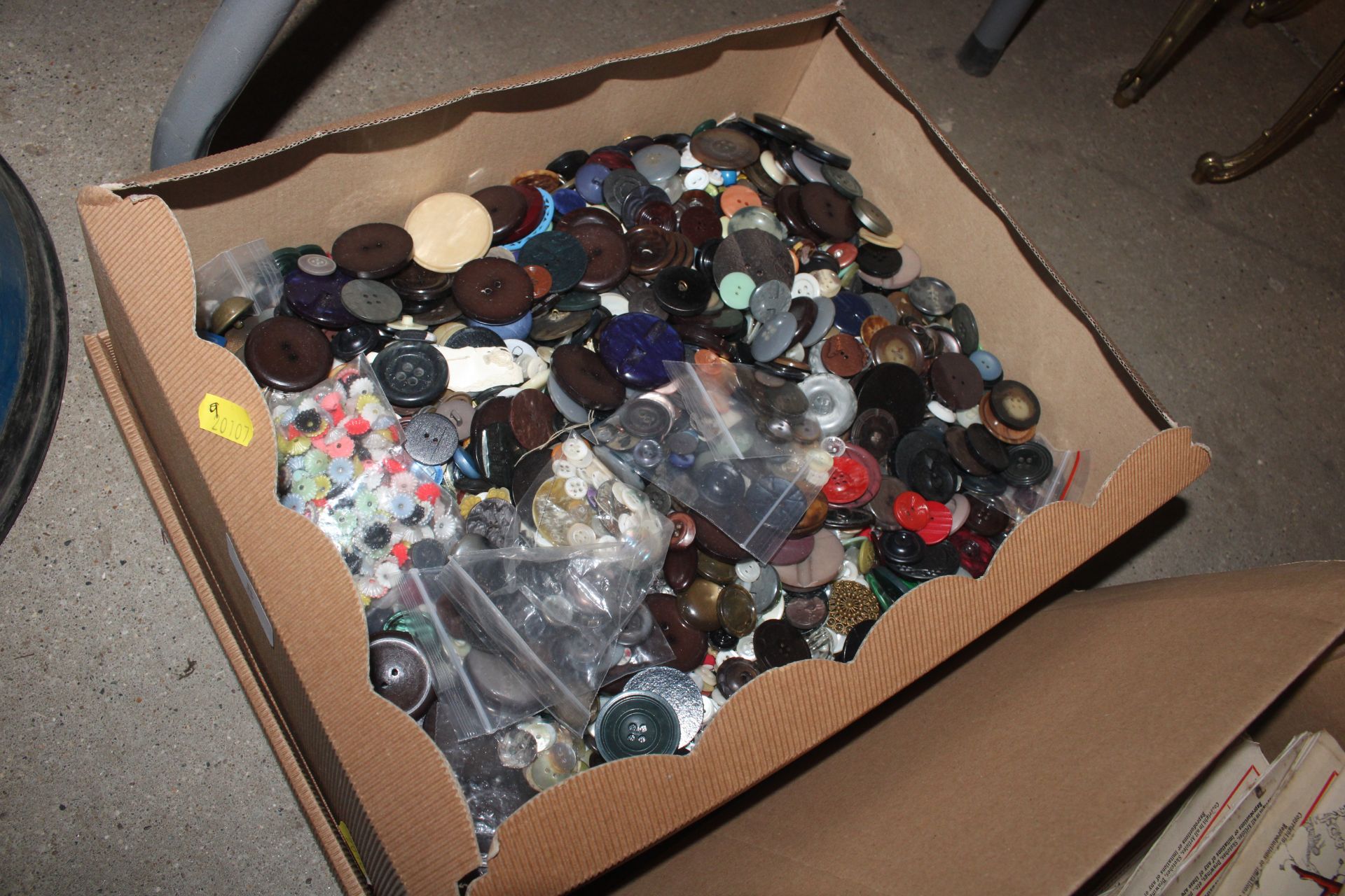 A large box of buttons
