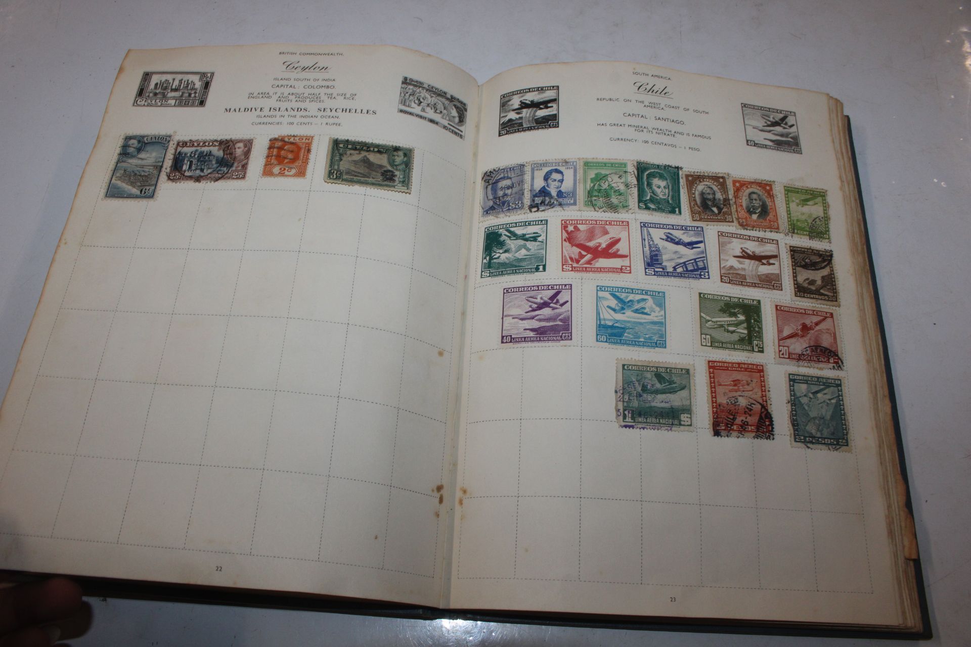 A box containing an album of stamps, various loose - Image 15 of 27