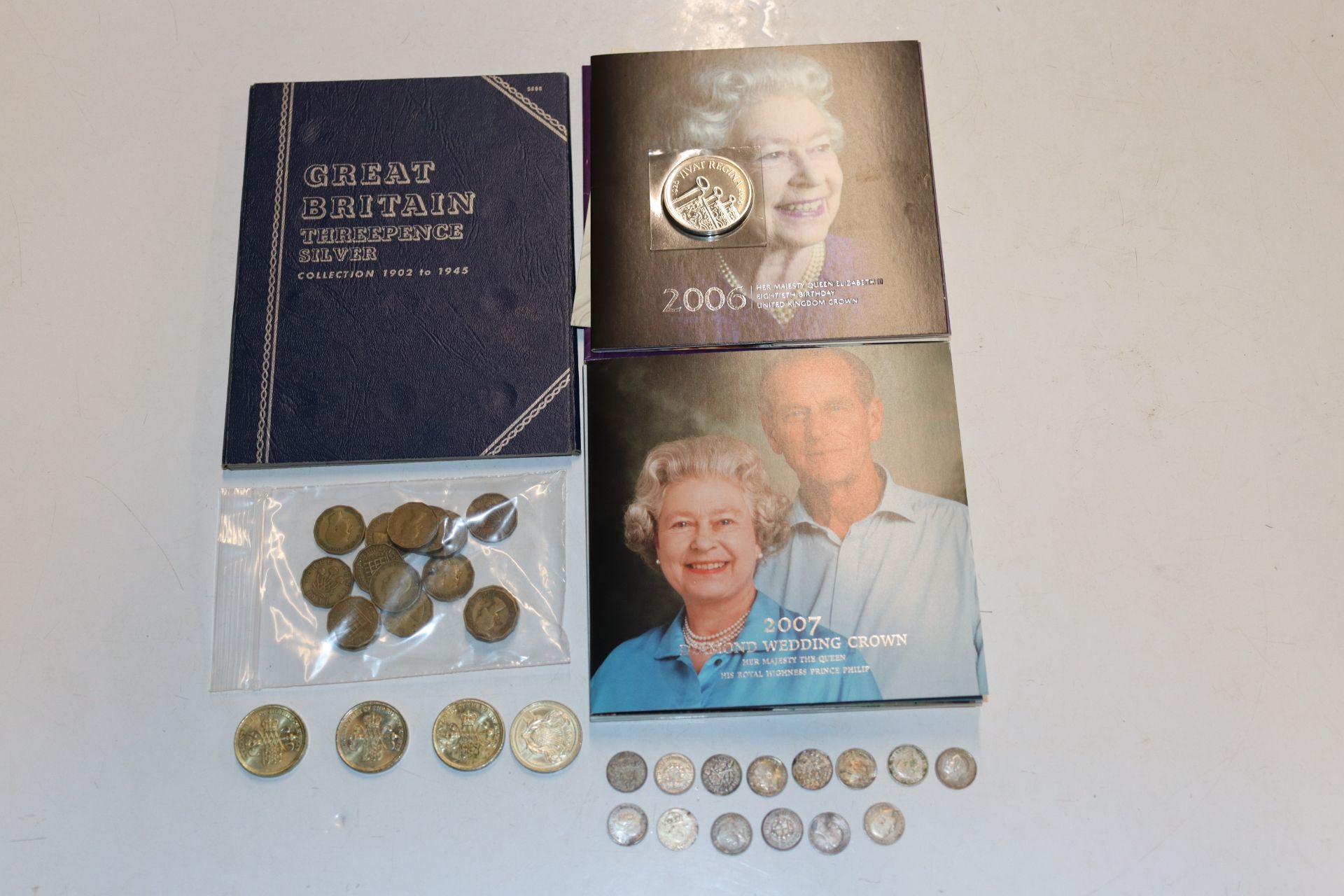 An album Great Britain Three Pence Collection and