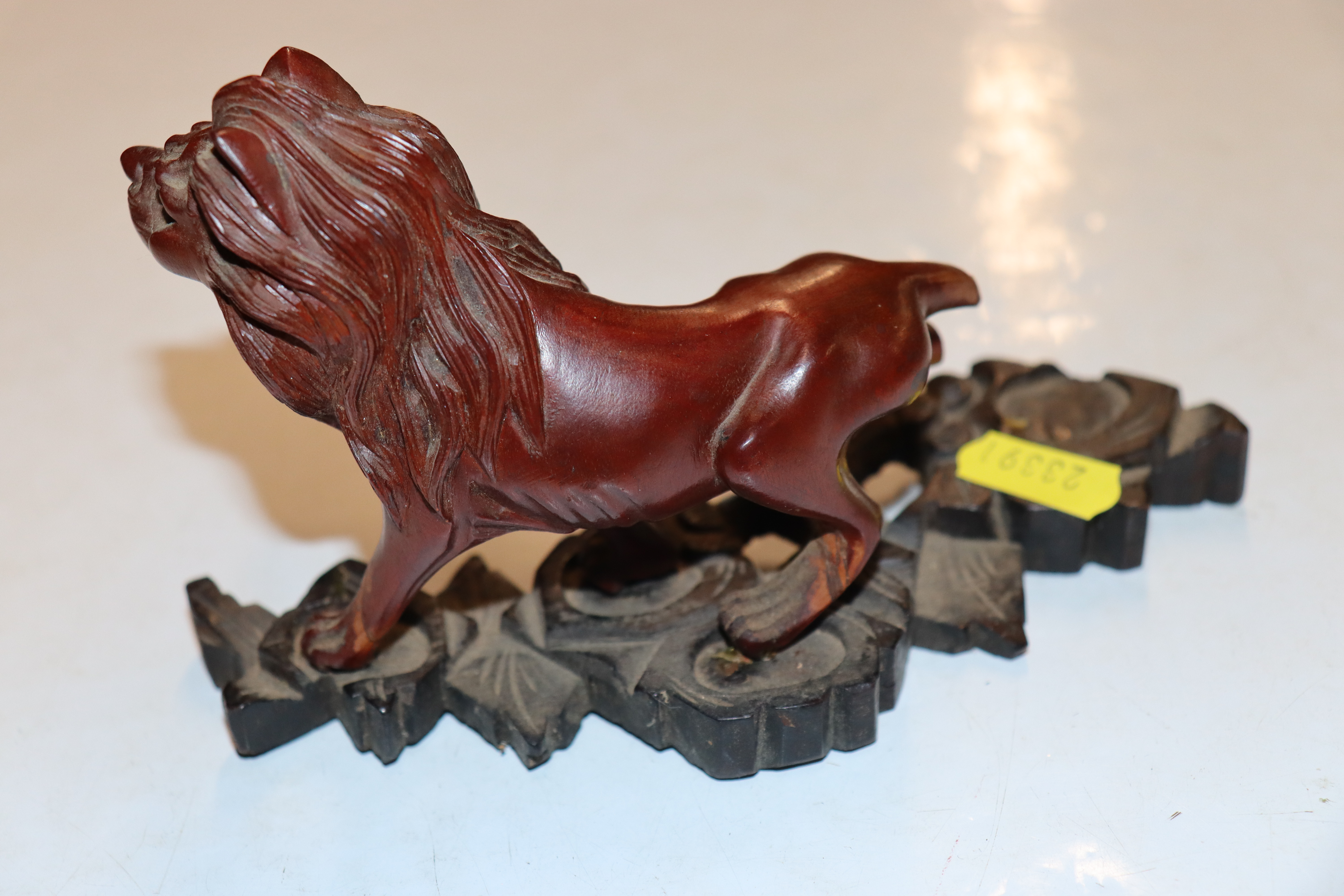 A carved wooden model of a lion AF; lacquered brus - Image 16 of 18