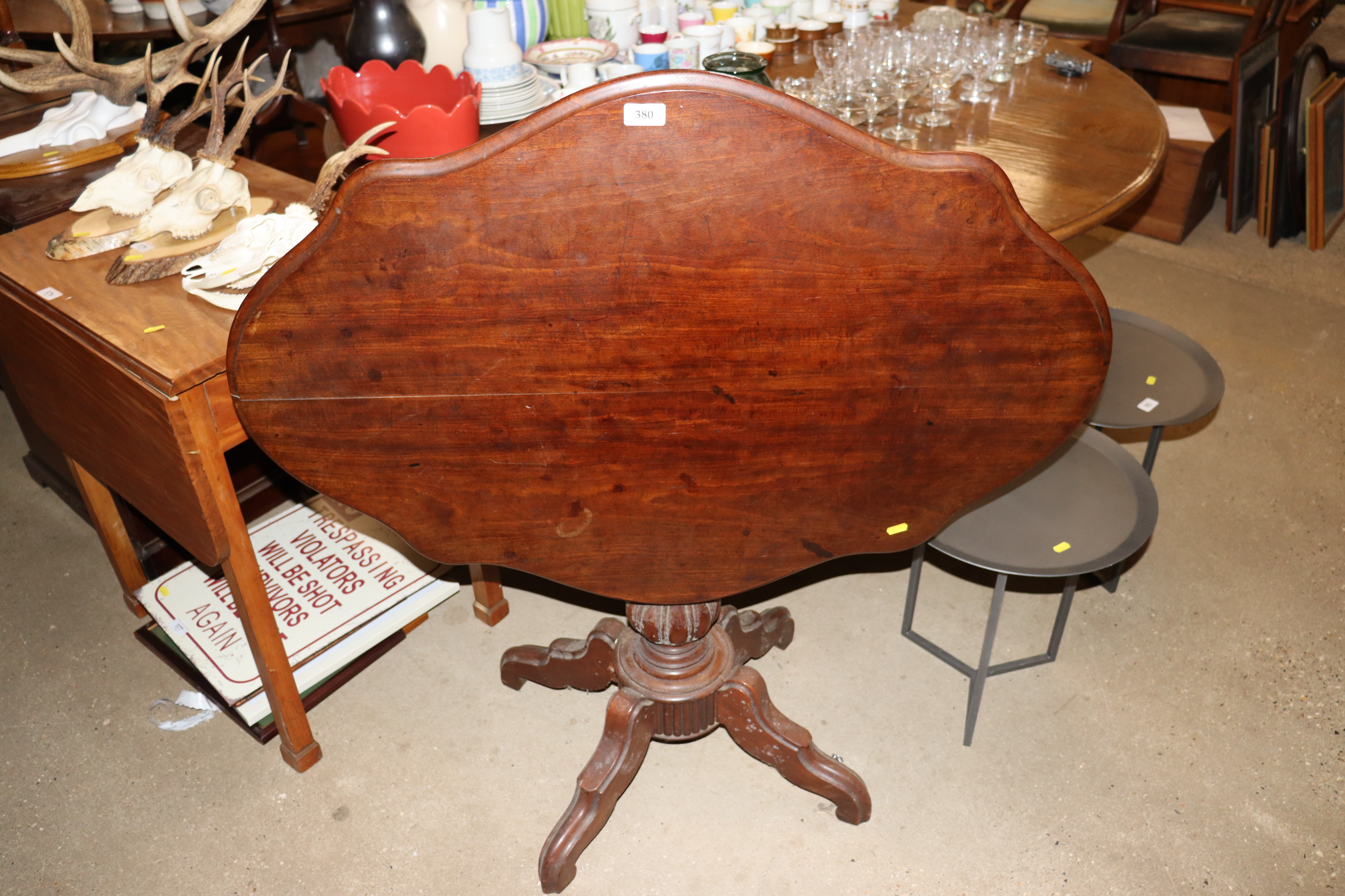 A 19th Century mahogany shaped topped occasional t