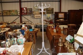 A white painted bent wood hat and coat stand