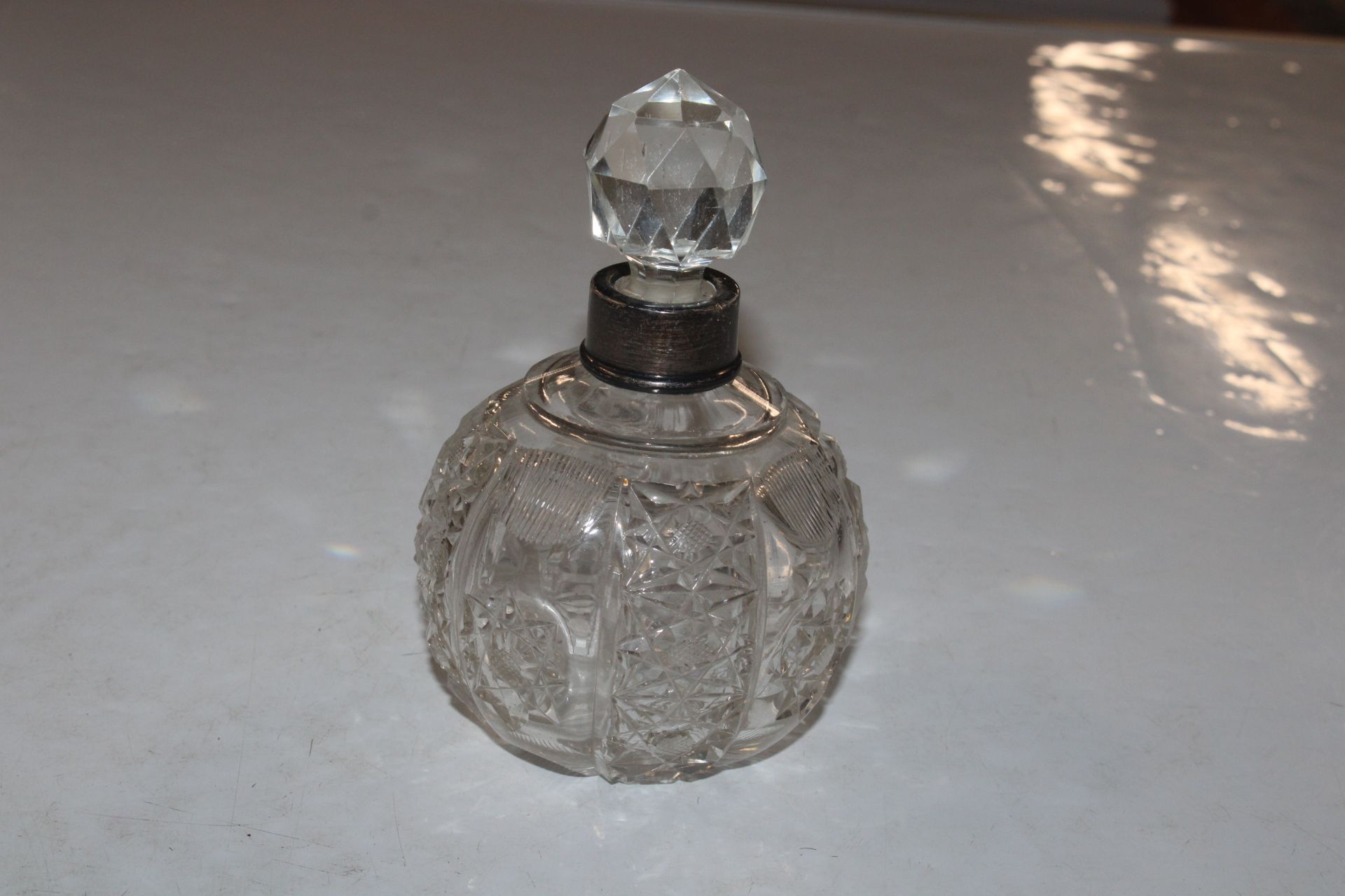 A cut glass scent bottle with white metal collar; a - Image 8 of 8