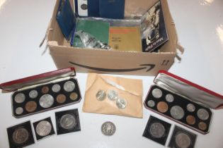 A box containing Royal Commemorative and other coi