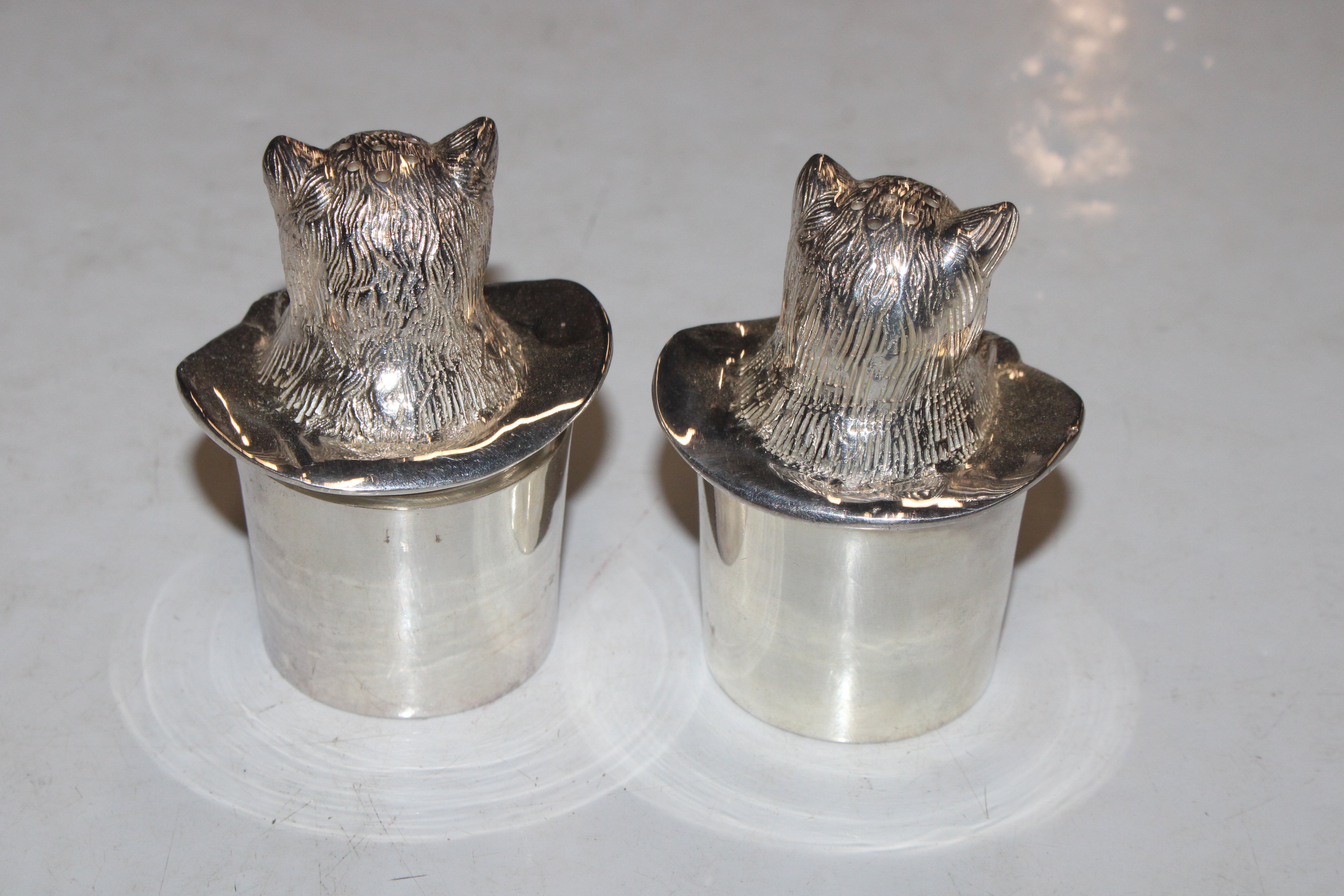 A pair of silver plated "Cat In The Hat" salt and - Image 3 of 4