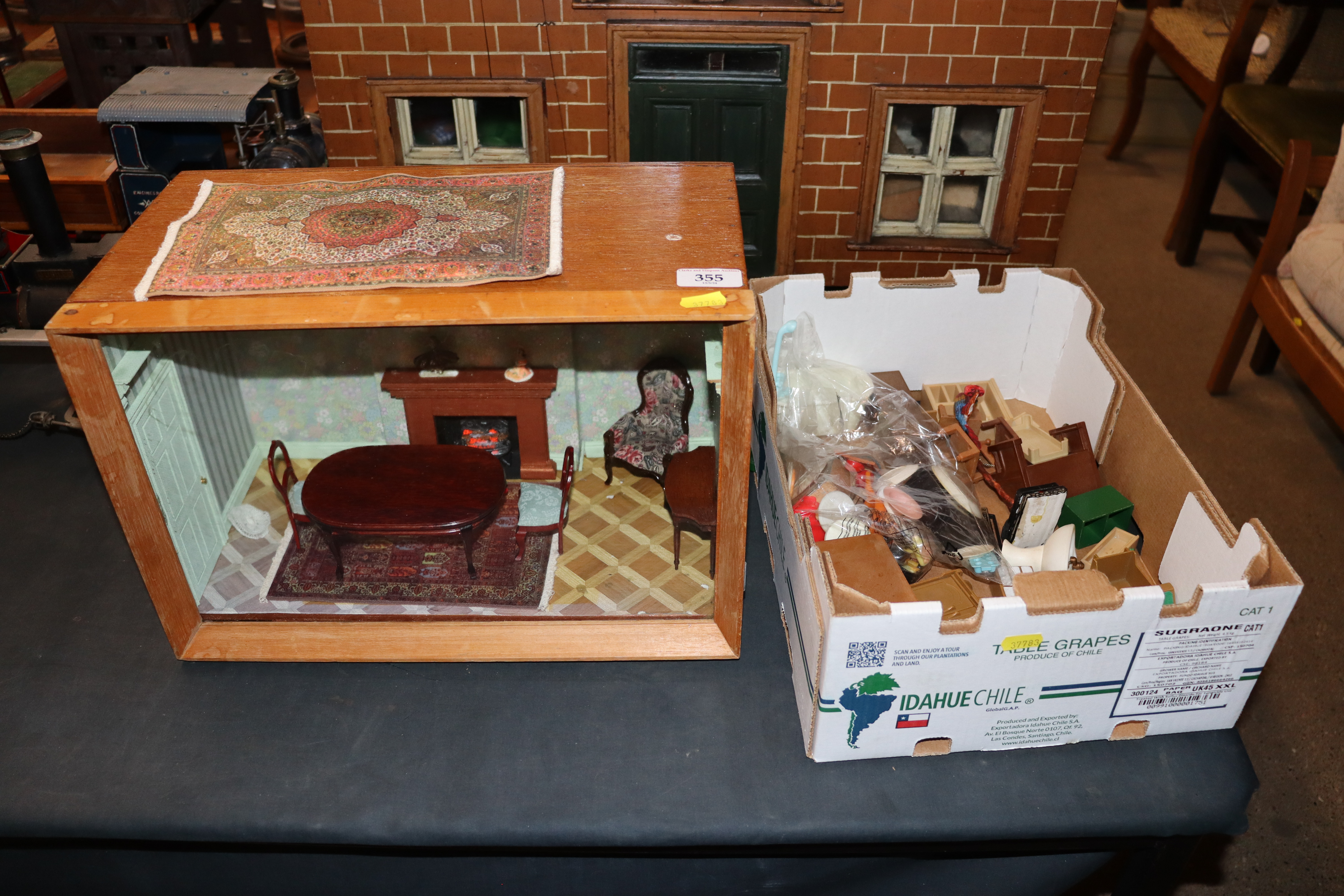 A quantity of doll's house furniture and a doll's