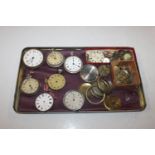 A tray of various pocket watches and parts for spa