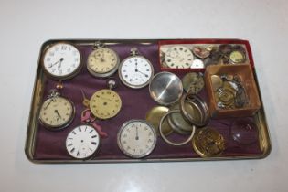 A tray of various pocket watches and parts for spa
