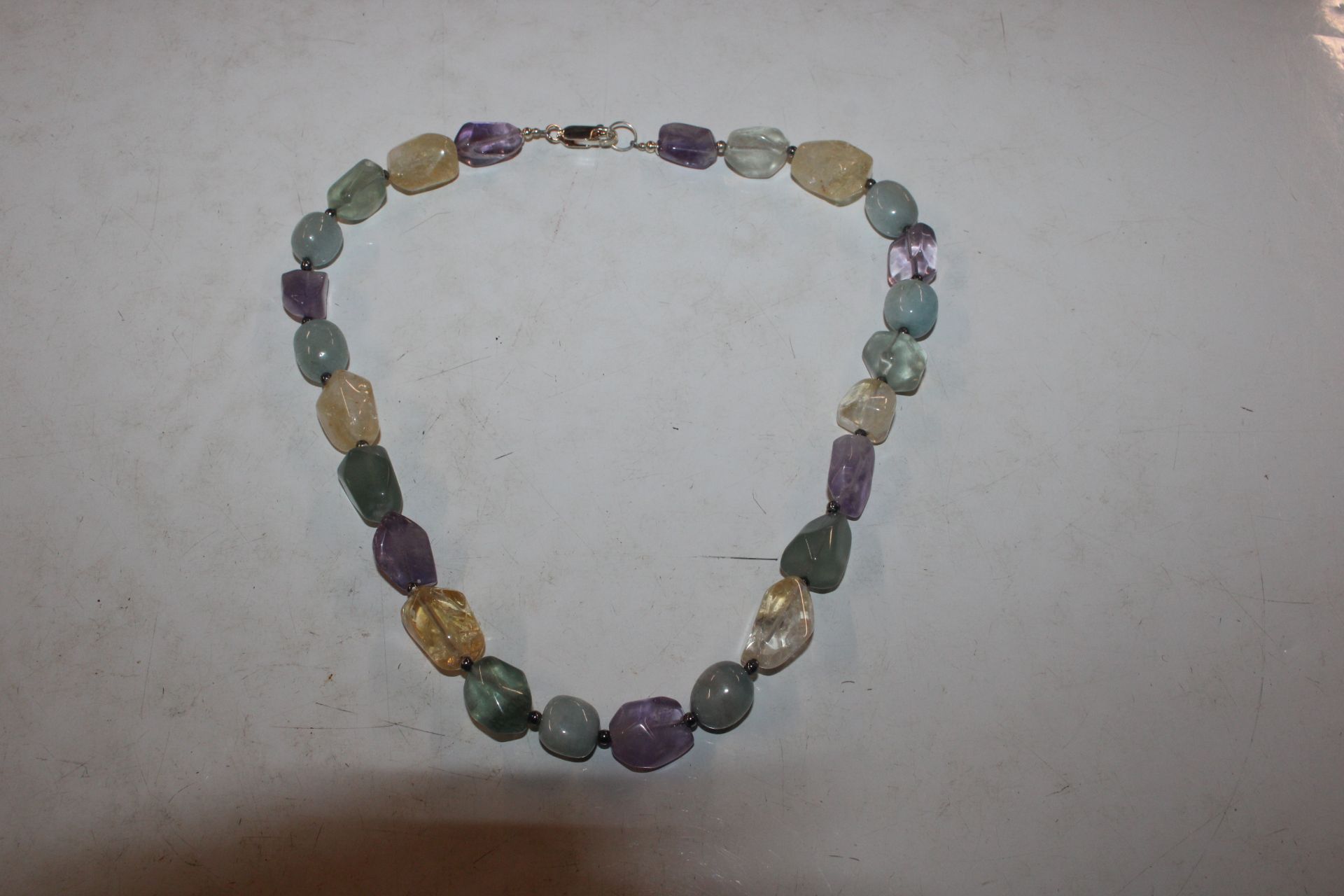 A Sterling silver amethyst, citrine and aqua marin