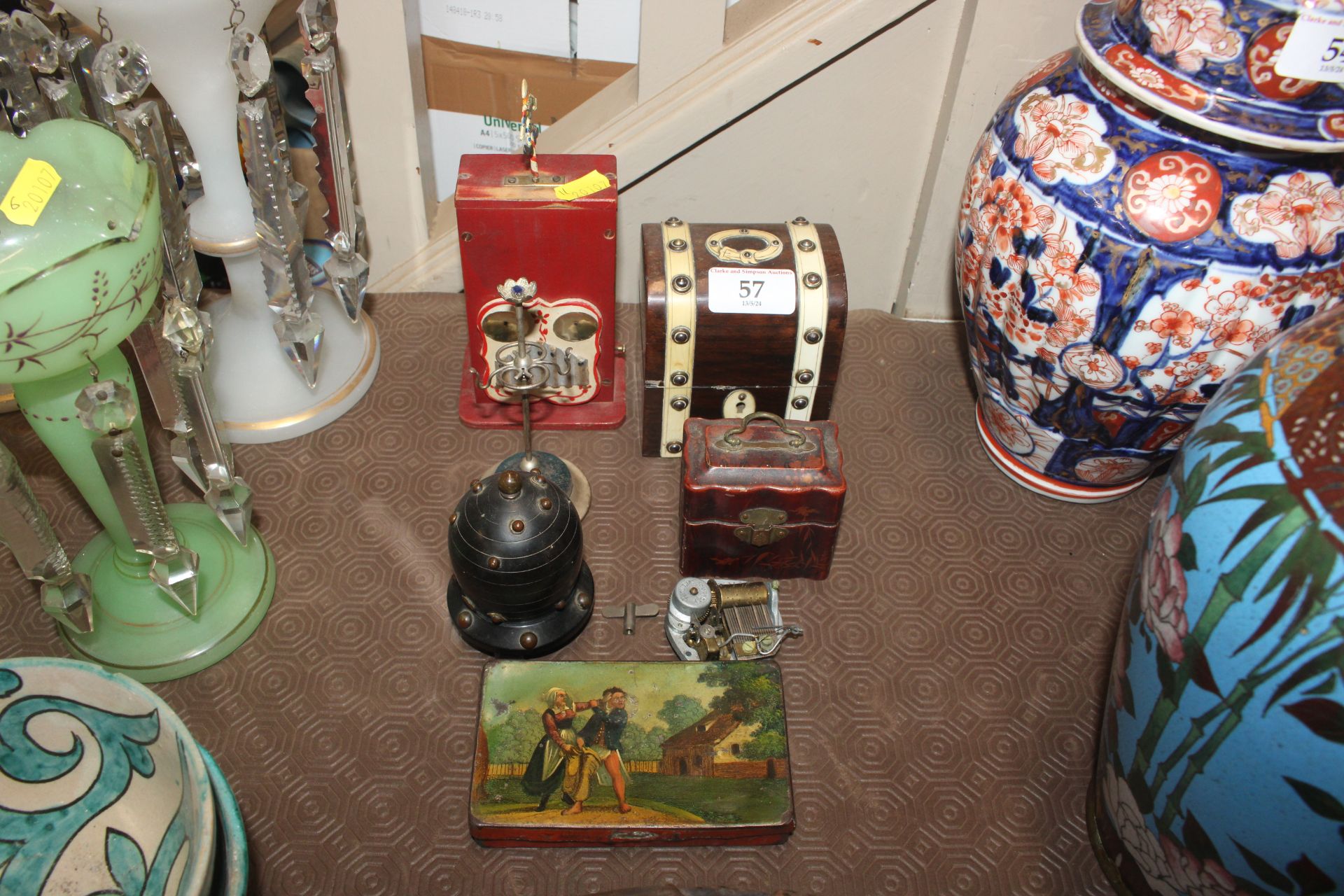 A lacquered trinket box; a wooden and bone inlaid