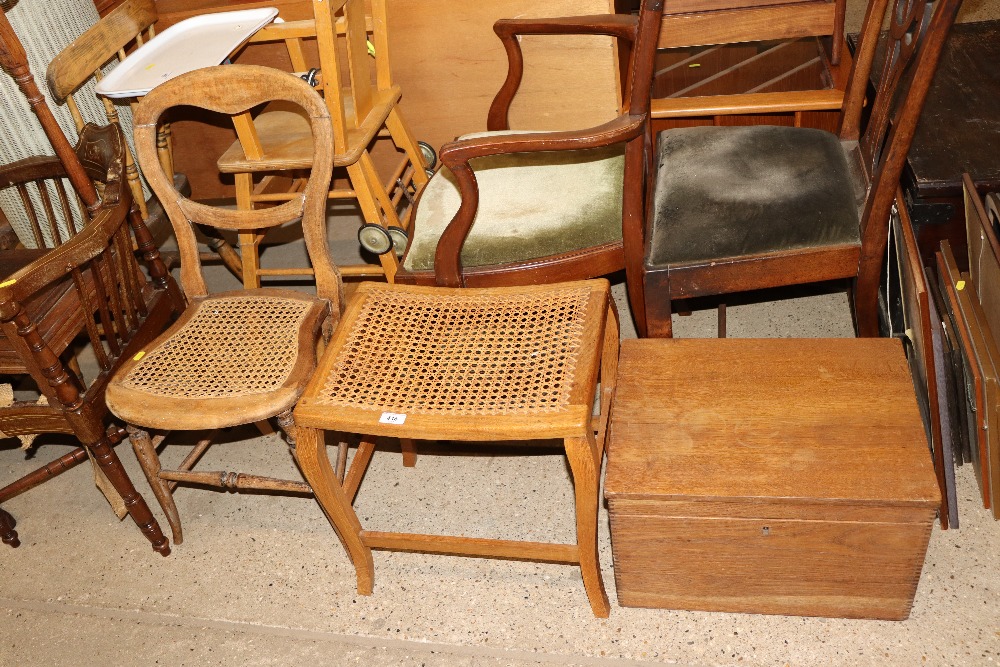 A cane seated chair; a cane seated dressing table
