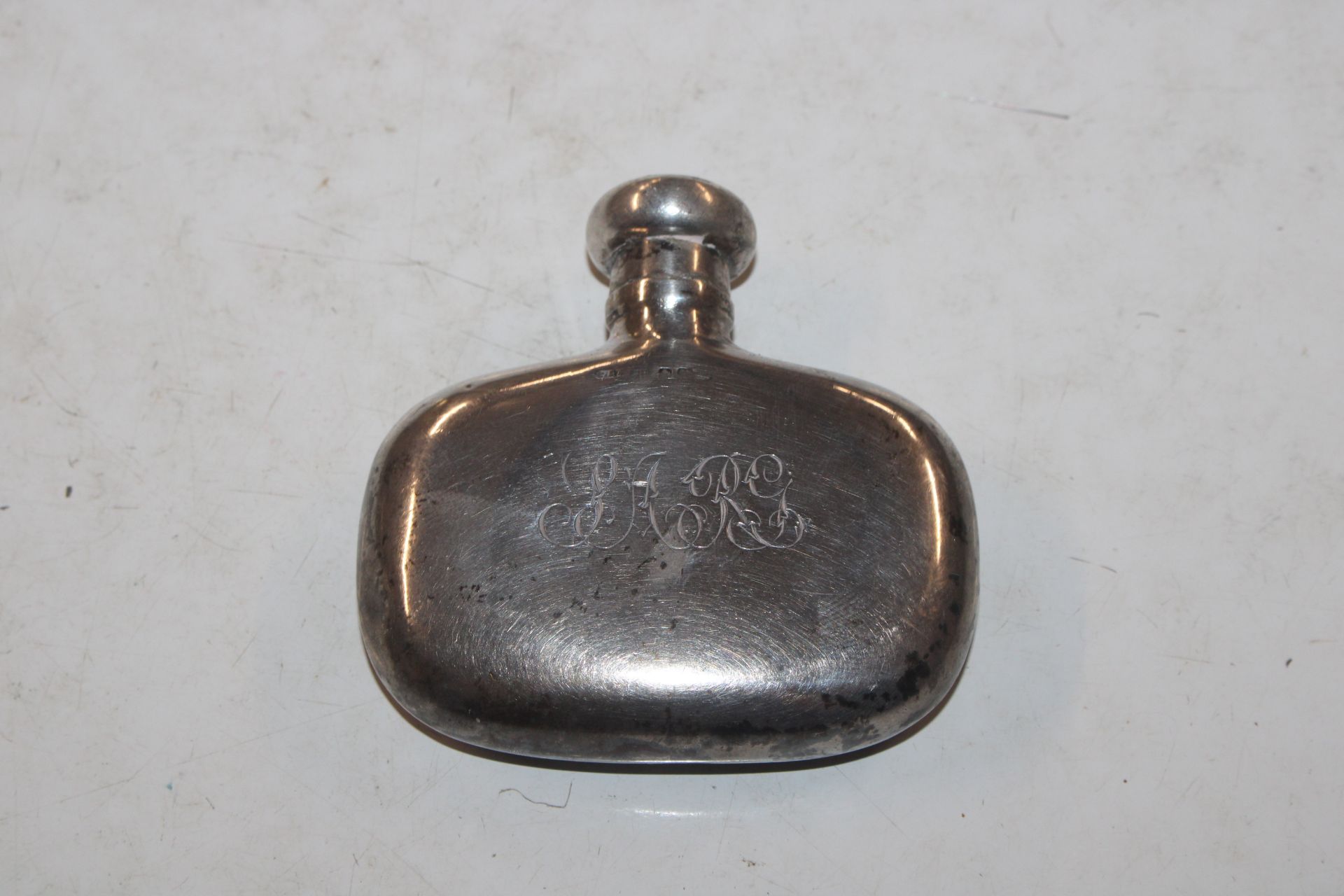 A small silver hip flask, approx. 51gms