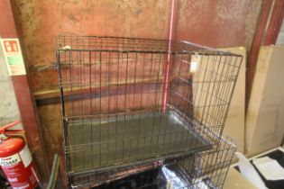 A folding metal pet cage