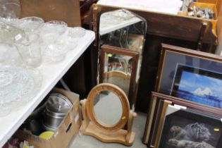 A pine swing framed mirror and two other mirrors