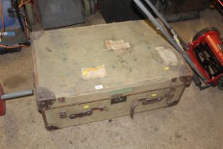 A leather bound canvas travelling trunk