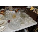 A collection of table glassware to include storage
