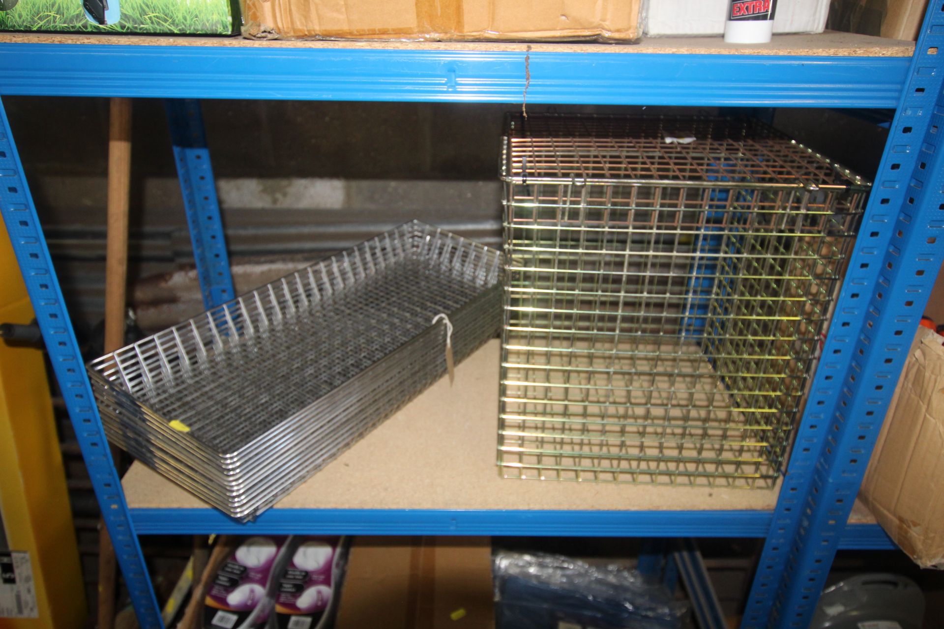 Twelve metal wire baskets and a metal post cage