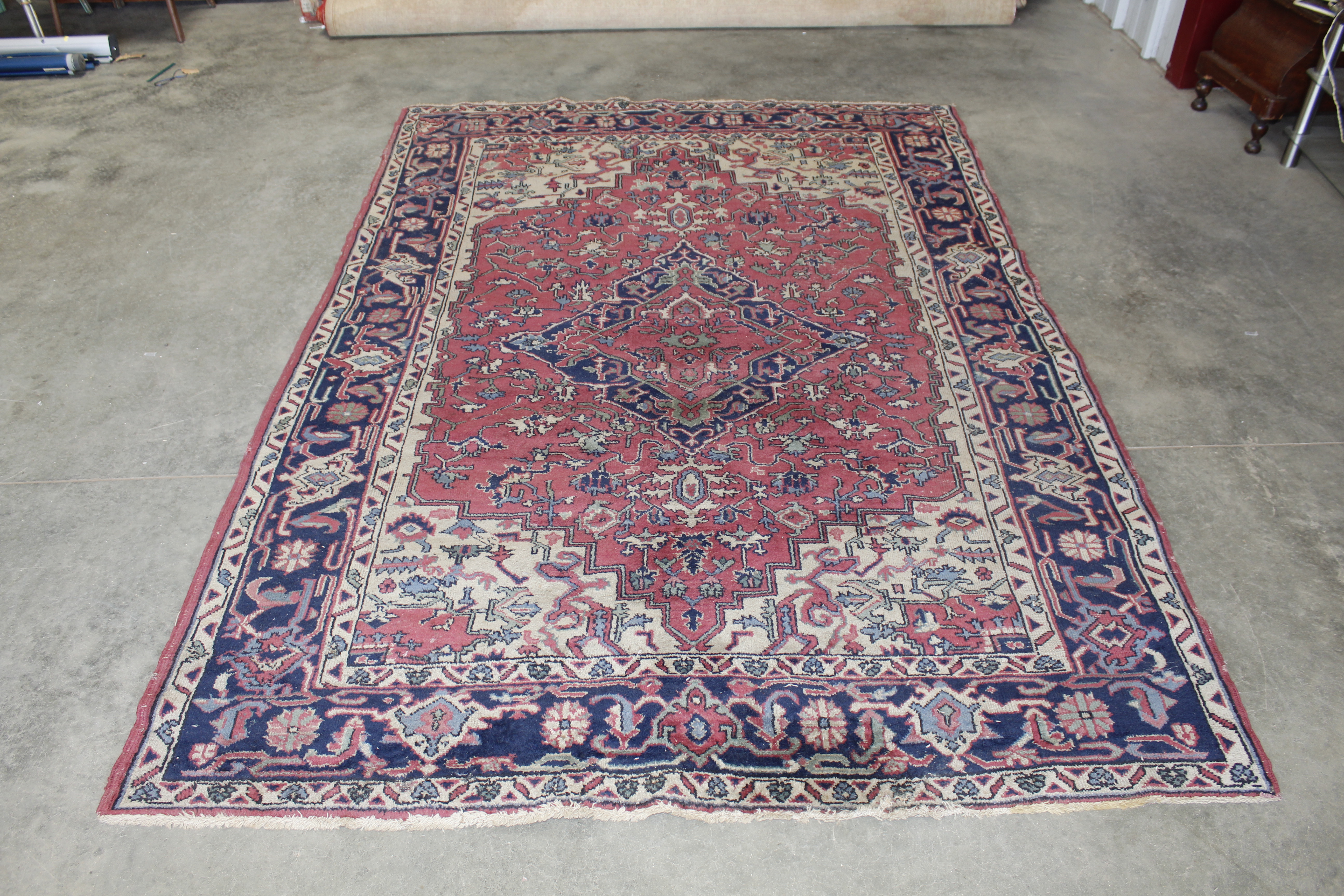 An approx. 9' x 6' patterned rug