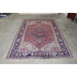 An approx. 9' x 6' patterned rug