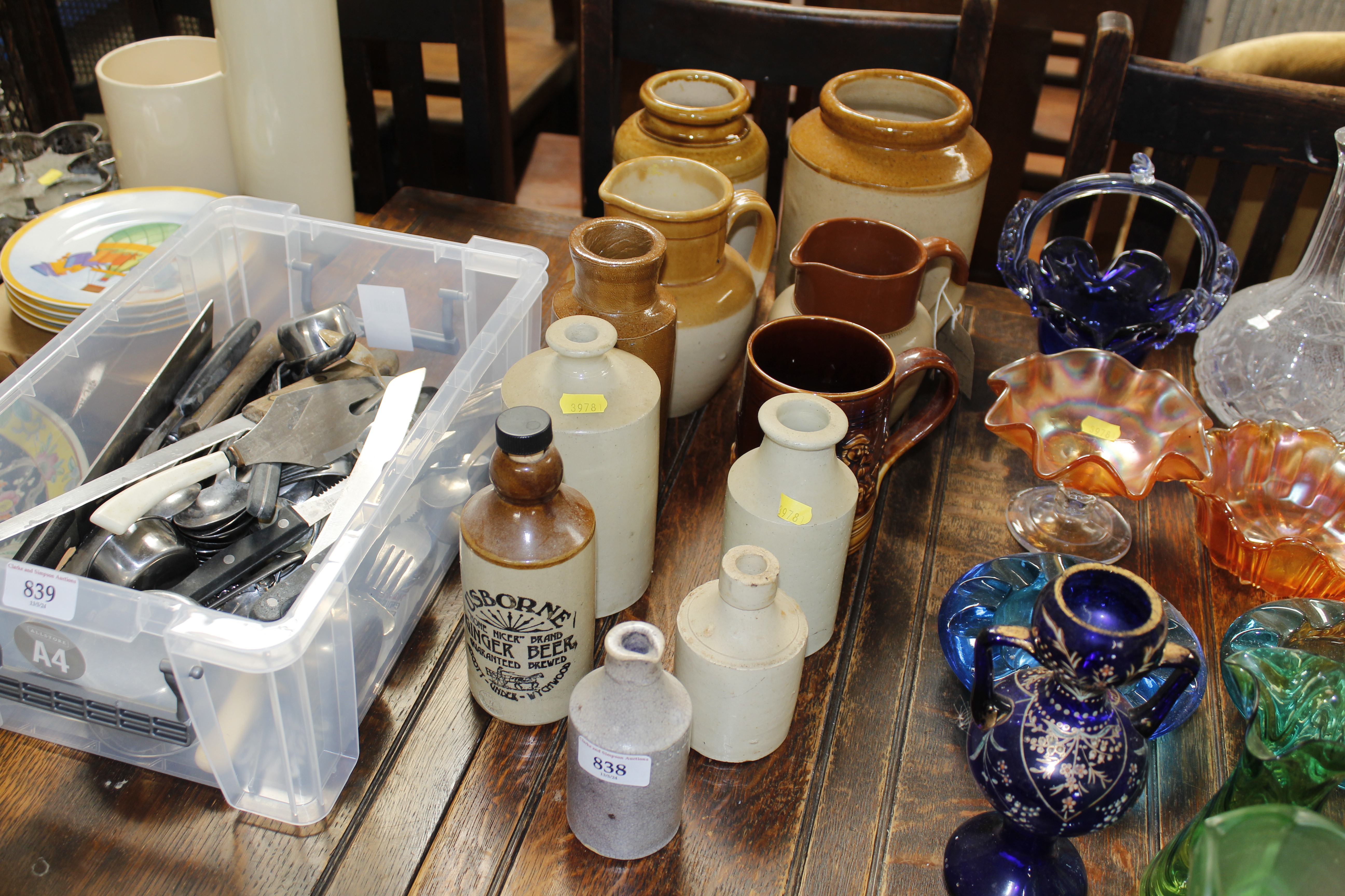 A collection of stoneware bottles, jars and jugs