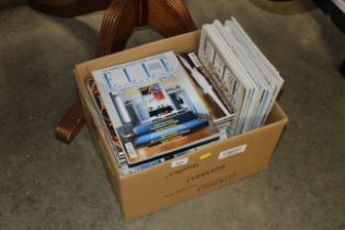 A box of Elle decorating magazines