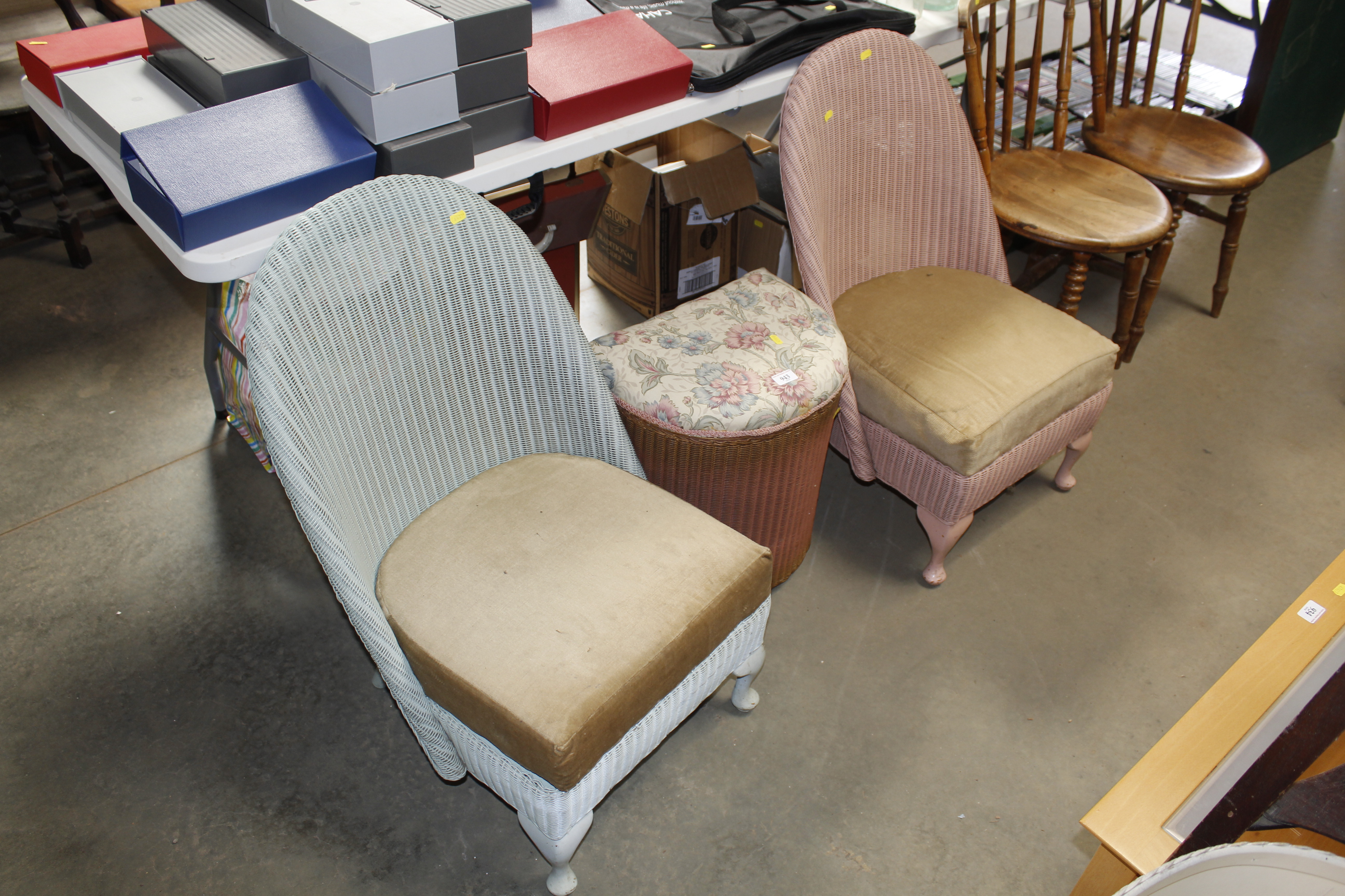 Two Loom chairs and a linen basket