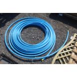 A quantity of blue plastic piping