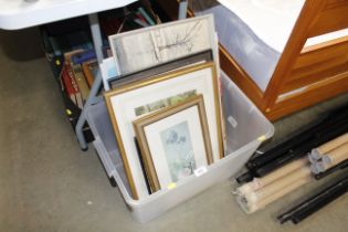 A box of various pictures and prints