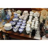 A collection of Wedgwood floral decorated coffee w