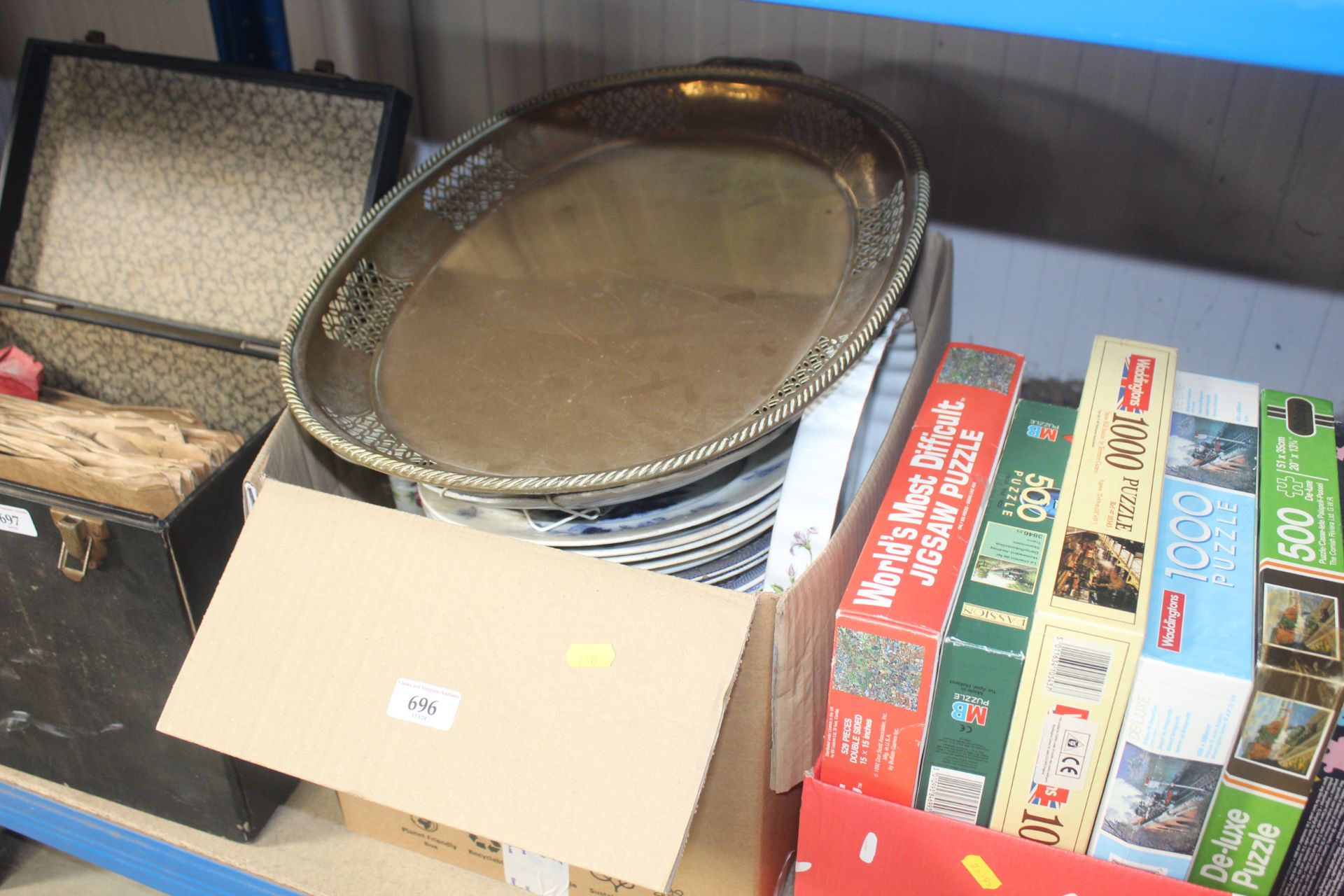 A box of various china and an oval brass tray