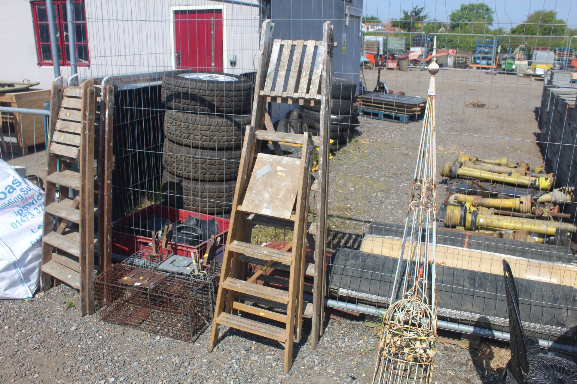 Two sets of wooden folding steps