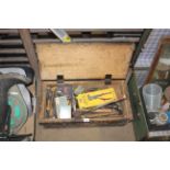 A wooden toolbox and contents of various tools to
