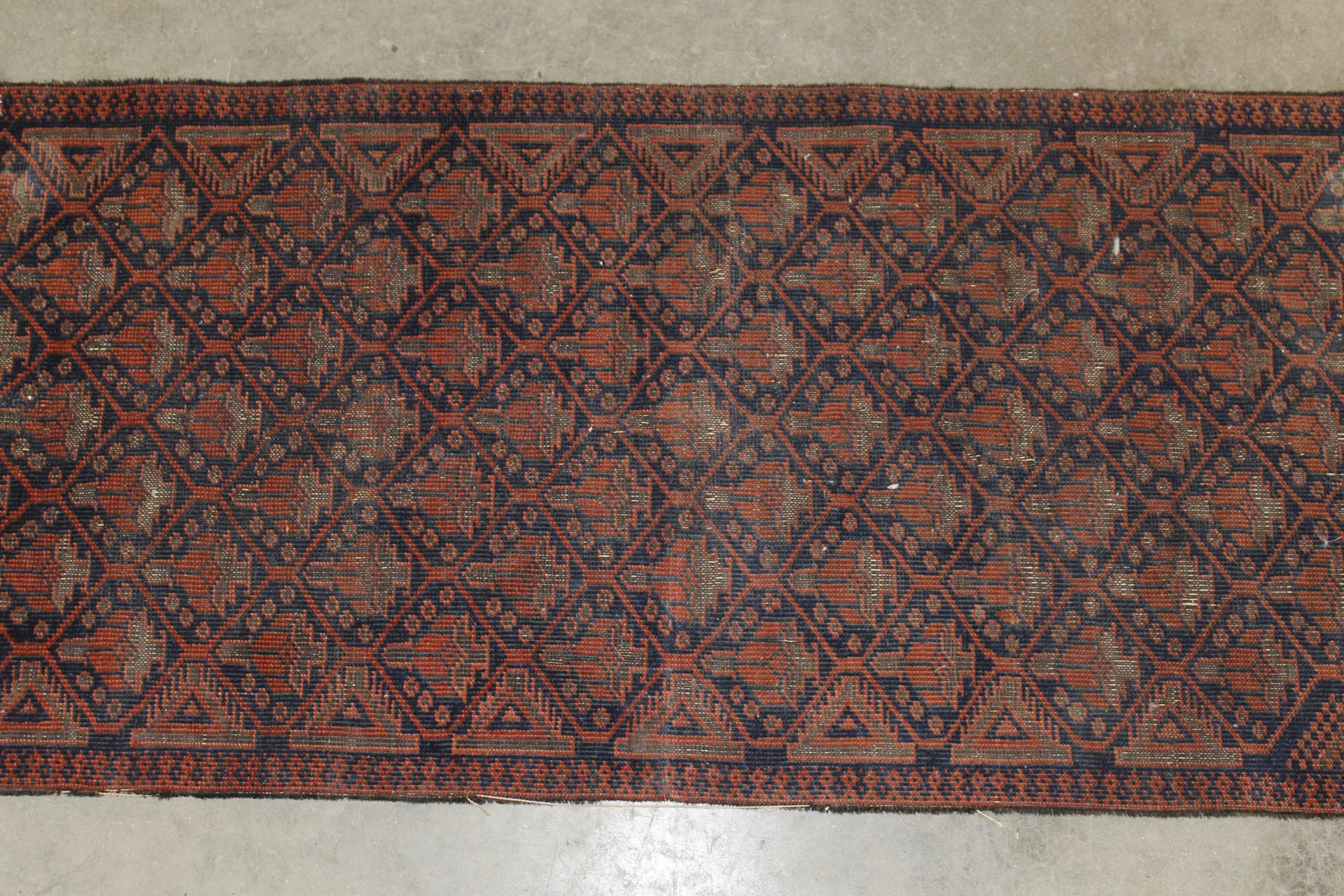 An approx. 3'7" x 1'8" pattern rug AF - Image 2 of 4