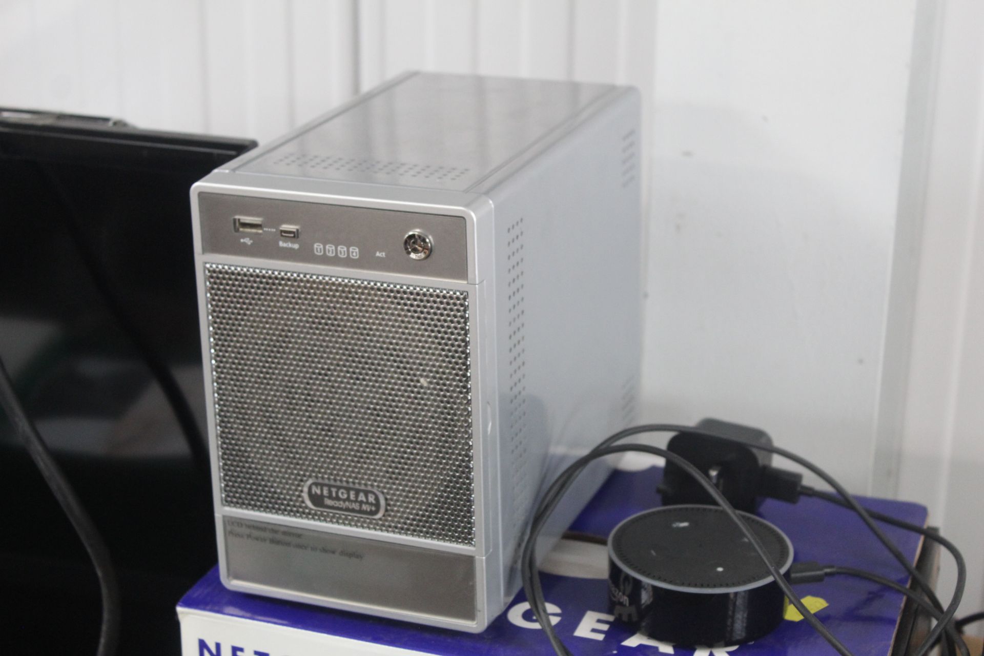 A Netgear desktop network storage box and an Amazo - Image 2 of 2
