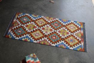 An approx. 4'11" x 2' Chobi Kilim runner