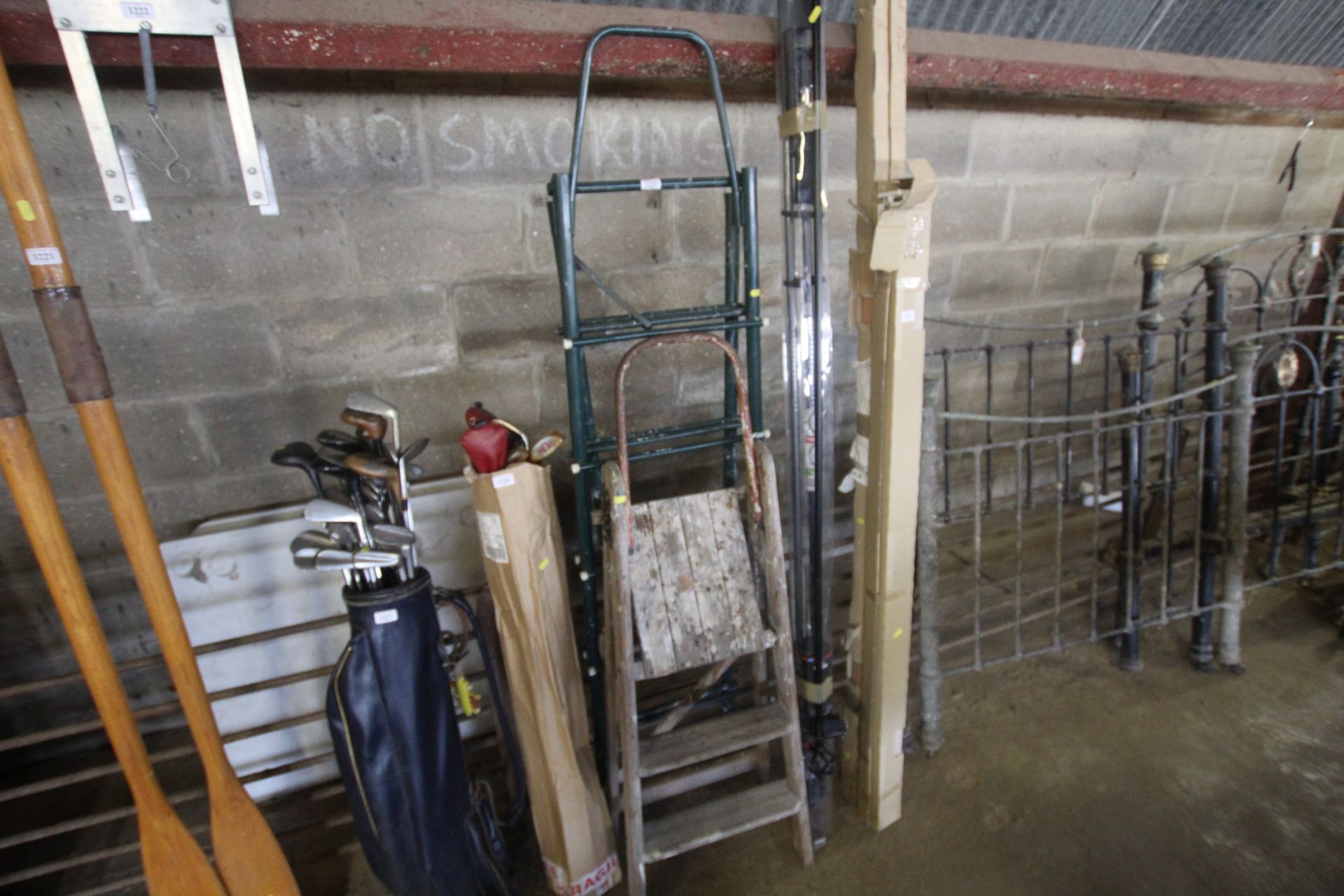 Two sets of folding metal steps