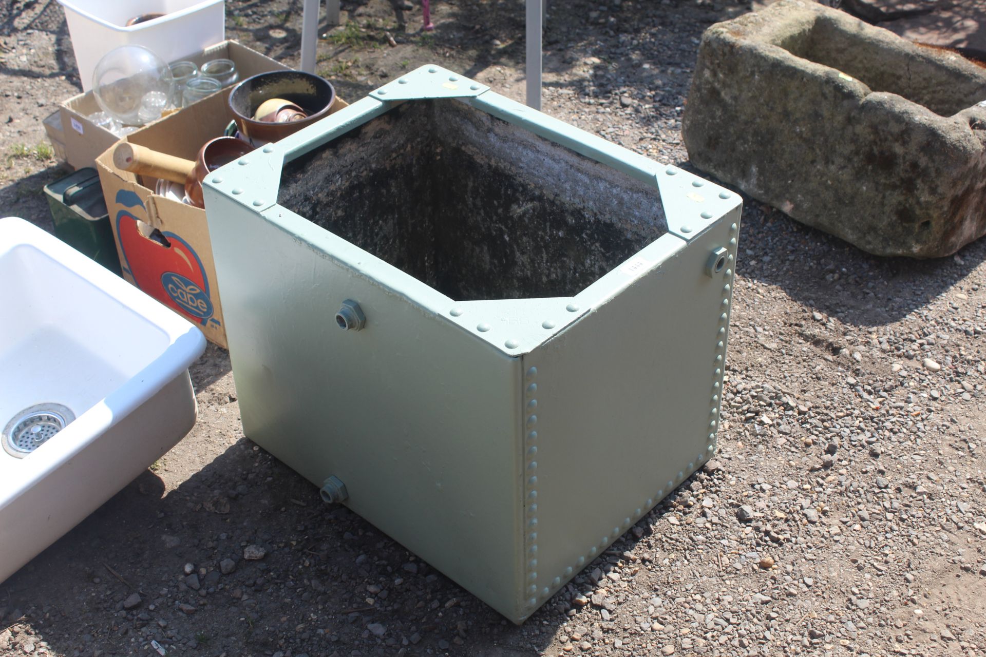 A painted galvanised water tank