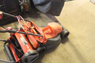 A Flymo RE320 electric lawnmower