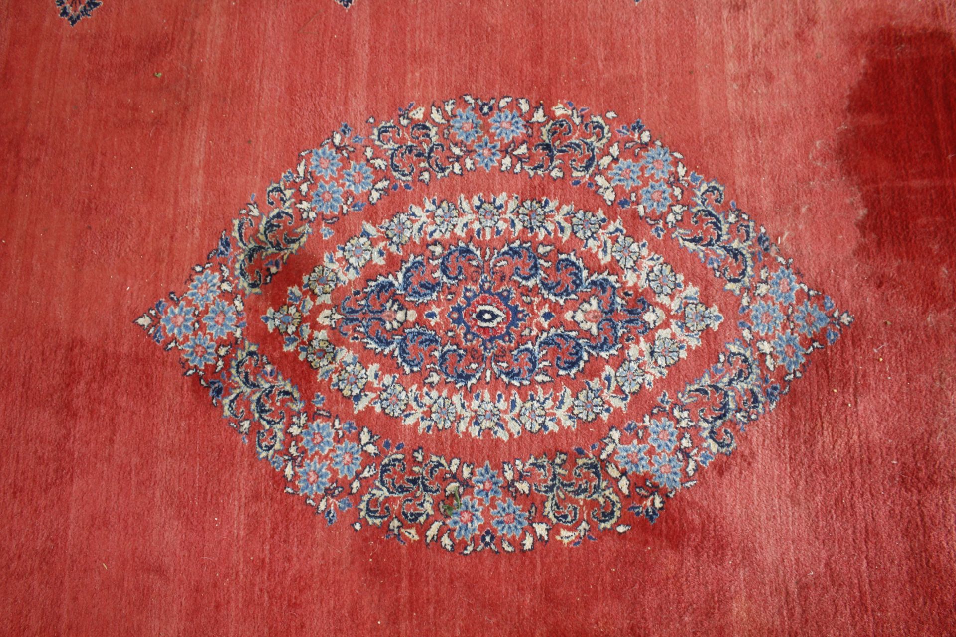 An approx. 12'9" x 9'8" red patterned rug AF - Image 2 of 10