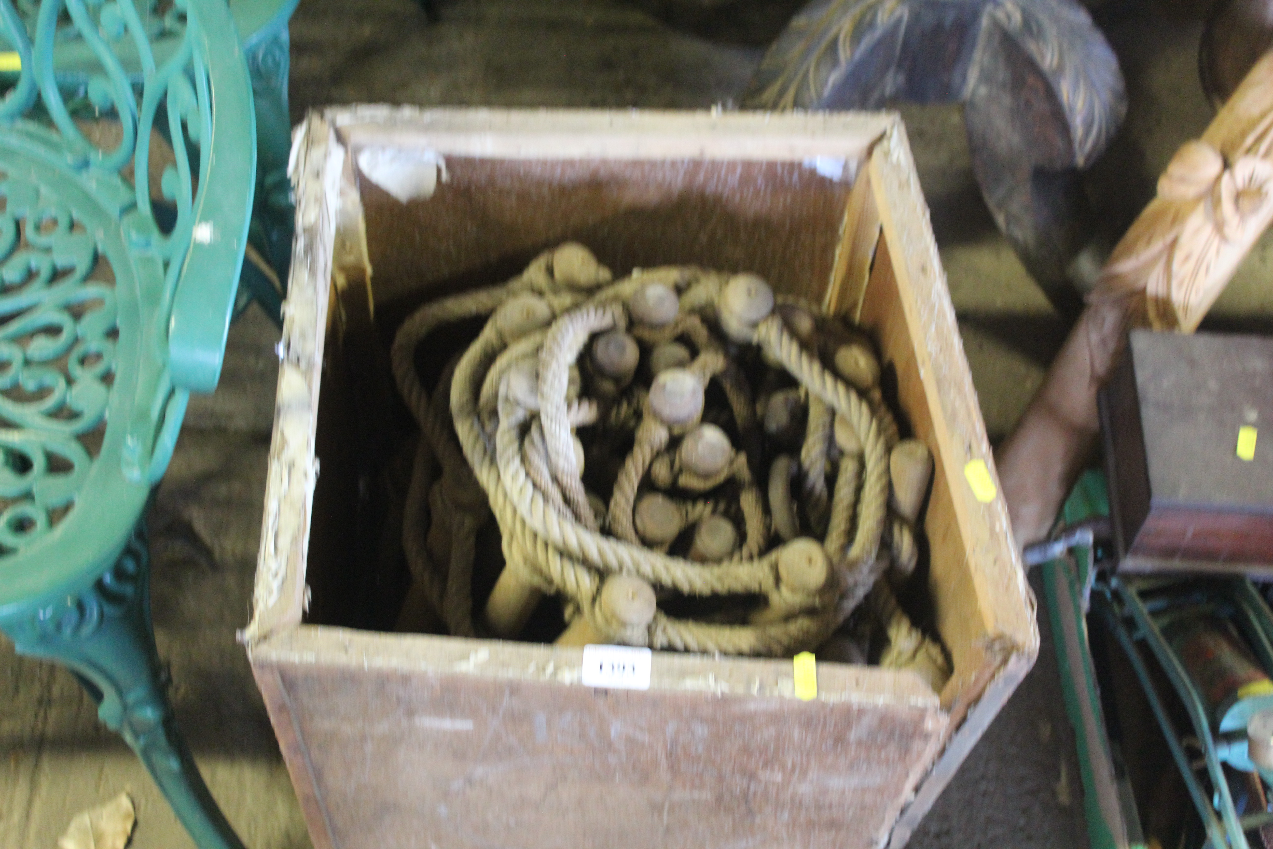 A wooden tea chest and contents of a vintage rope