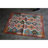 An approx. 4'10" x 3'3" Chobi Kilim rug