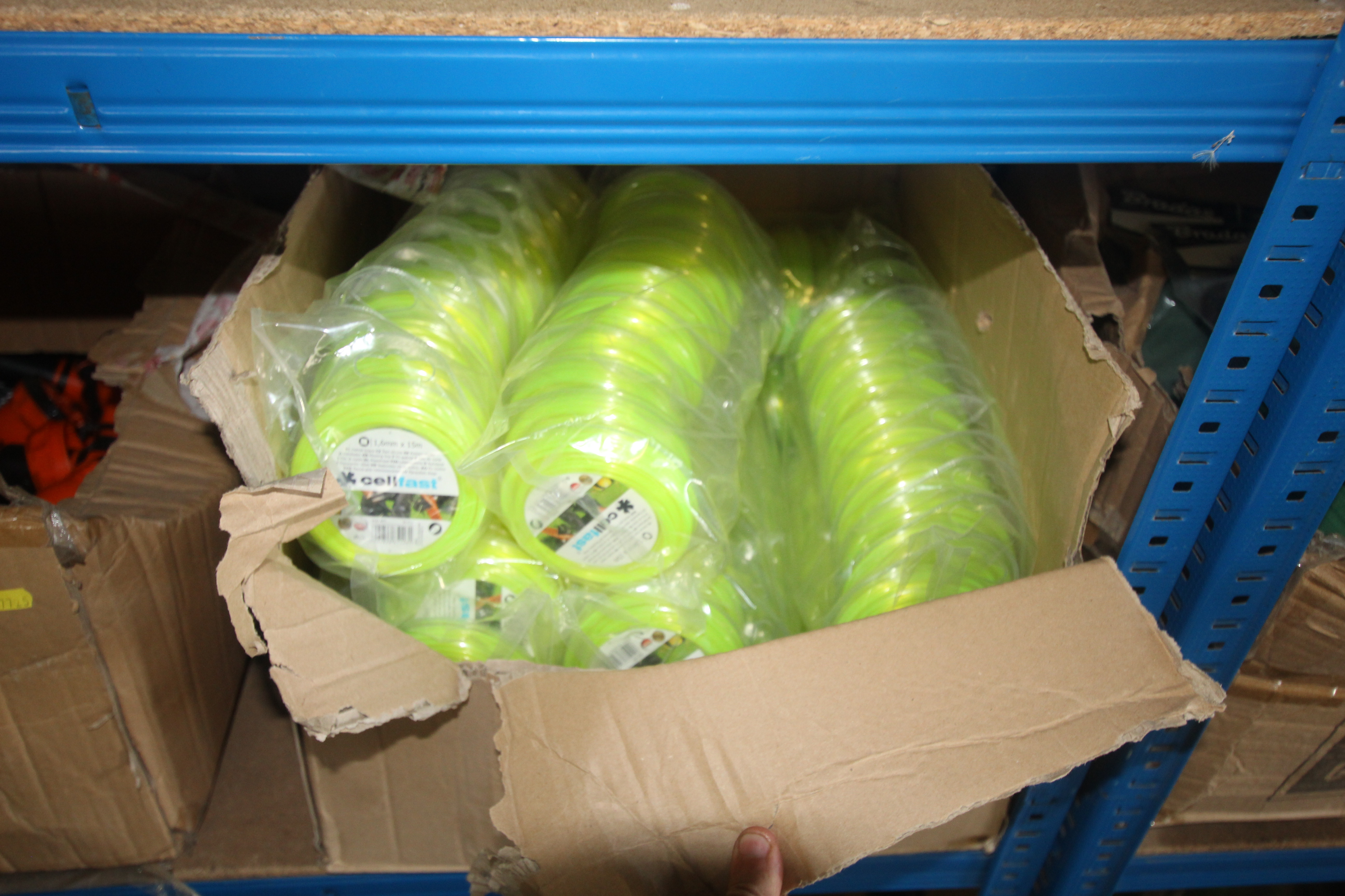 A box containing a large quantity of Cellfast neon
