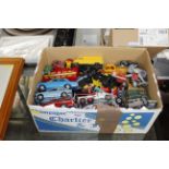 A box of die cast model vehicles