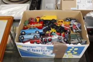 A box of die cast model vehicles