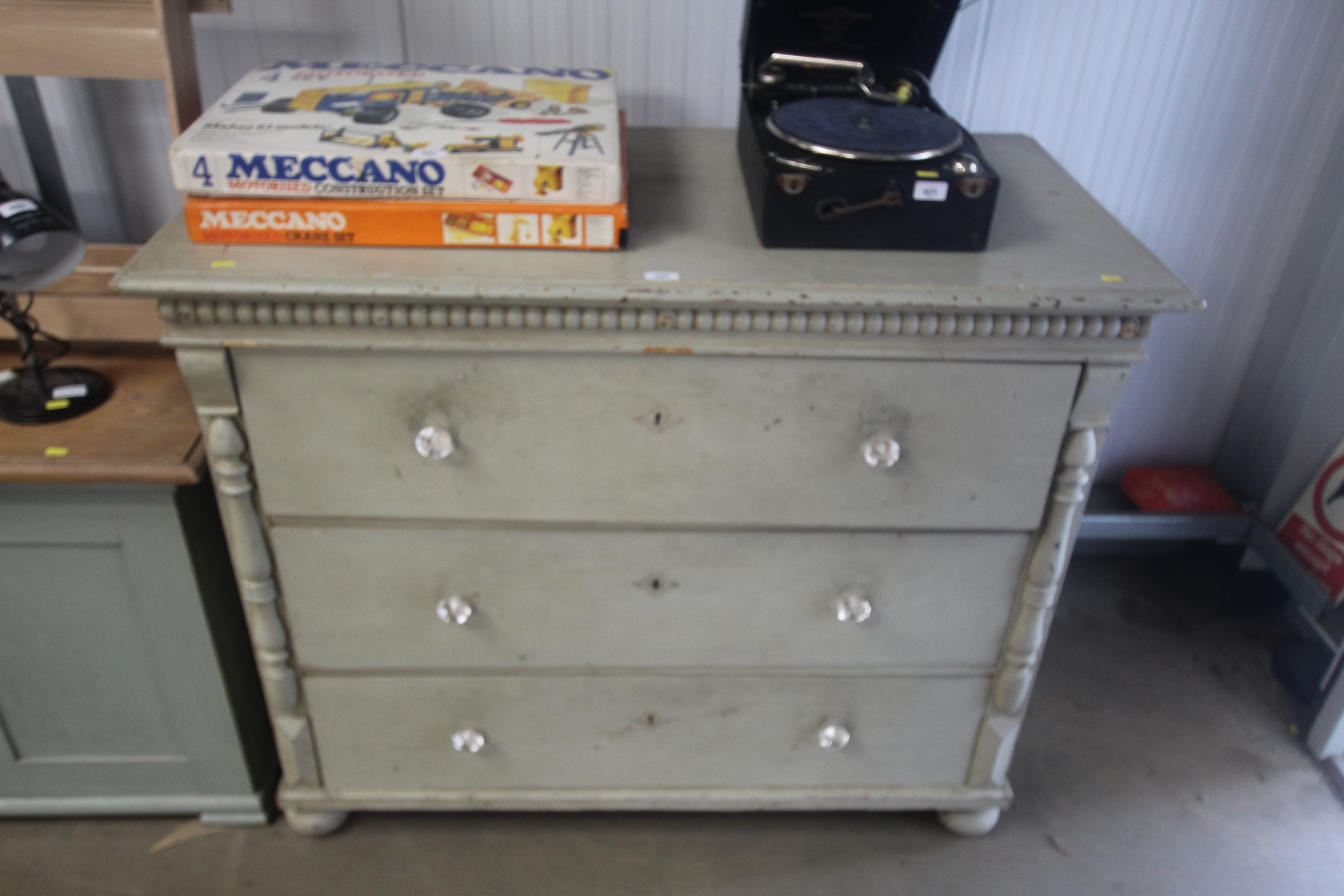 A Continental painted pine chest fitted three drawers