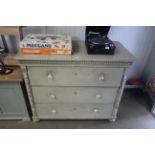 A Continental painted pine chest fitted three drawers
